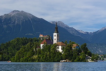 A view from above of Lake Bled and the Assumption of Mary Pilgrimage Church, Slovenia, Europe