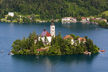 A view from above of Lake Bled and the Assumption of Mary Pilgrimage Church, Slovenia, Europe