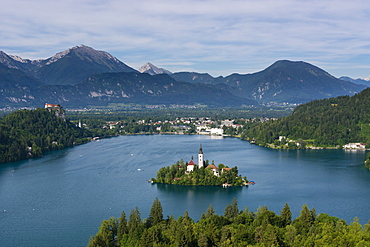 A view from above of Lake Bled and the Assumption of Mary Pilgrimage Church, Bled, Slovenia, Europe