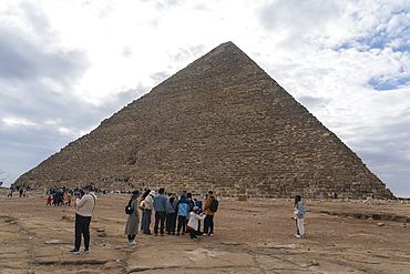 Tourists at the Great Pyramids complex, Giza, Egypt.