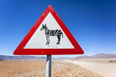 Zebra crossing animal warning sign, Namib Desert, Namibia, Africa