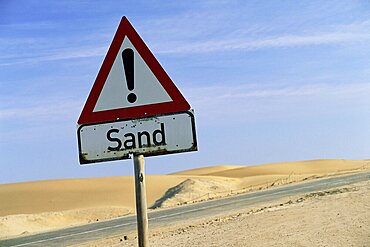 Road sign warning of sand, Swamopmund, Namibia, Africa