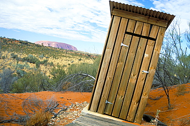 Outback dunny and Uluru (Ayers Rock), Uluru-Kata Tjuta National Park, Northern Territory, Australia, Pacific