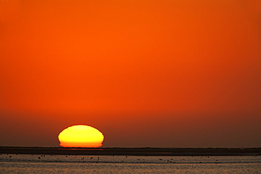 Sunset over Walvis Bay lagoon, Namibia, Africa