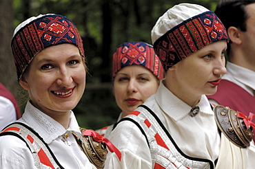 Folk dancers in traditional costume, Open Air Ethnographic Museum (Latvijas etnografiskais brivdabas muzejs), near Riga, Latvia, Baltic States, Europe