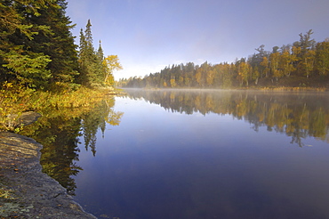 Misty morning on Hoe Lake, Boundary Waters Canoe Area Wilderness, Superior National Forest, Minnesota, United States of America, North America