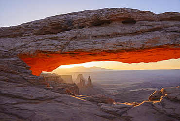 Mesa Arch at dawn looking towards Washerwoman Arch, Islands in the Sky section of Canyonlands National Park, Utah, United States of America, North America