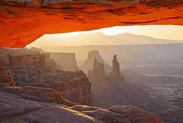 Mesa Arch at dawn looking towards Washerwoman Arch, Islands in the Sky section of Canyonlands National Park, Utah, United States of America, North America