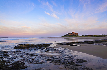 Bamburgh Castle at dusk, Northumberland, England, United Kingdom, Europe