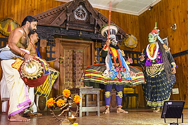 Men in traditional costume during Kerala Kathakali performance in Kochi, Kerala, India, Asia