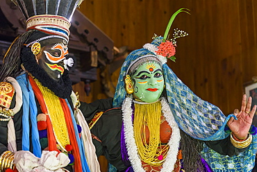 Men in traditional costume during Kerala Kathakali performance in Kochi, Kerala, India, Asia