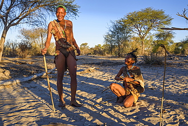 Tourist walk with San Bushmen at Meno a Kwena camp, Kalahari, Botswana, Africa