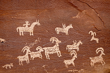 Bighorn hunt petroglyph panel, Arches National Park, Utah, United States of America, North America