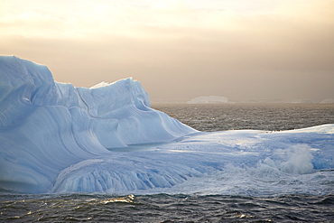 Iceberg at dawn, off Laurie Island, South Orkney Islands, Polar Regions