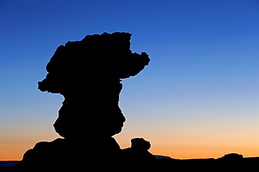 Silouetted sandstone formation at dawn, Coyote Buttes Wilderness, Vermilion Cliffs National Monument, Arizona, United States of America, North America