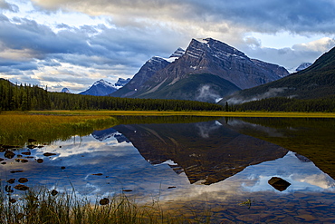 Mountain reflected in Waterfowl Lake at sunrise, Banff National Park, UNESCO World Heritage Site, Alberta, Rocky Mountains, Canada, North America