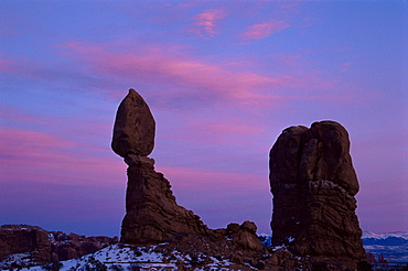 Balanced Rock at dusk, with snow, Arches National Park, Utah, United States of America, North America