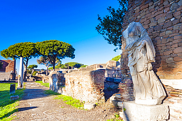 The statue of Victory on the rear of the Temple of Rome and Augustus, Ostia Antica archaeological site, Ostia, Rome province, Latium (Lazio), Italy, Europe