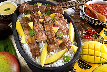 Madagascan food, mosakiki, zebu skewers with mango and rice, Madagascar, Africa