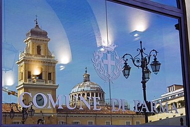 Piazza Garibaldi reflected in the glass of the Town Hall, Parma, Emilia Romagna, Italy, Europe