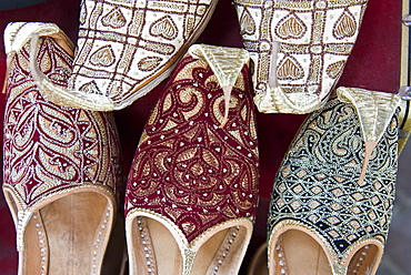 Curly toed slippers for sale in Bur Dubai Souk, Dubai, United Arab Emirates, Middle East