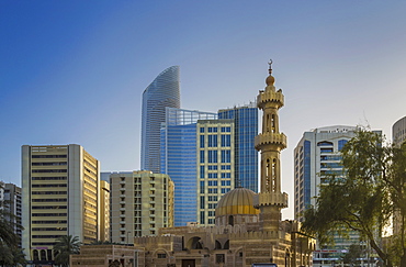 Mosque and modern buildings downtown Abu Dhabi, United Arab Emirates, Middle East