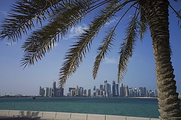 Futuristic skyscrapers on the distant Doha skyline, Qatar, Middle East