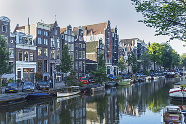 Houses by a canal, Amsterdam, The Netherlands, Europe