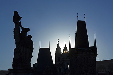 Old Town Bridge Tower and statue on Charles Bridge, UNESCO World Heritage Site, Prague, Czech Republic, Europe