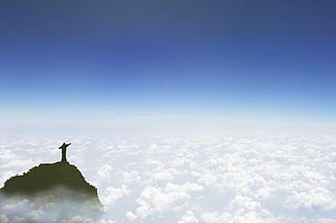 Statue of Christ the Redeemer above the clouds, Corcovado, Rio de Janeiro, Brazil, South America