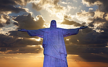 Statue of Christ the Redeemer at sunset, Corcovado, Rio de Janeiro, Brazil, South America