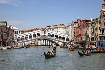 Gondolas by Rialto Bridge in Venice, Italy, Europe