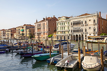 Boats moored on Grand Canal in Venice, Italy, Europe