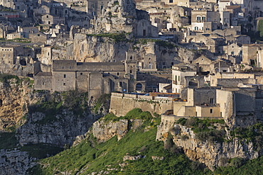 View of Chiesa di San Pietro Caveoso in the Sassi area of Matera and ravine, Basilicata, Italy, Europe