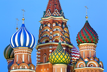 Onion domes of St. Basil's Cathedral in Red Square illuminated in the evening, UNESCO World Heritage Site, Moscow, Russia, Europe