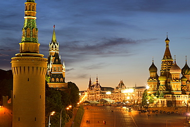 The Kremlin, Gum department store and the onion domes of St. Basil's Cathedral in Red Square illuminated at night, UNESCO World Heritage Site, Moscow, Russia, Europe