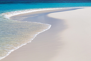 The crystal clear water of the Indian Ocean and a deserted beach on an island in the Maldives, Indian Ocean, Asia 