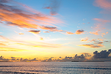 Dawn sky over the Indian Ocean from an island in the Maldives, Indian Ocean, Asia