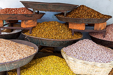 Dishes of spices for sale in a street market in the city of Udaipur, Rajasthan, India, Asia