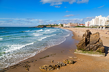 Large rock on the beach and seafront in Biarritz, Pyrenees Atlantiques, Aquitaine, France, Europe