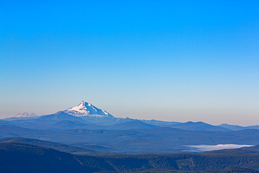 Mount Jefferson and mist over Trillium Lake, seen from Mount Hood, part of the Cascade Range, Pacific Northwest region, Oregon, United States of America, North America