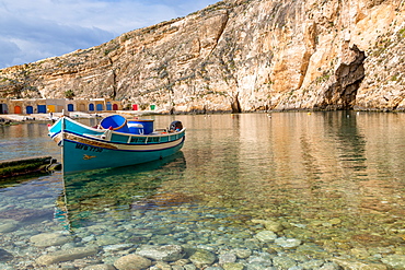 Traditional boat in the harbour at Dwejra Inland Sea in Gozo, Malta, Mediterranean, Europe