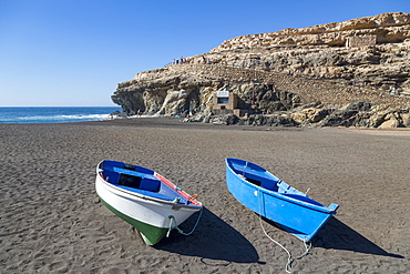 Small fishing boats on Playa Ajuy on the volcanic island of Fuerteventura, Canary Islands, Spain, Atlantic, Europe