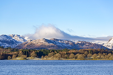 Looking towards the north end of Windermere near Ambleside, with rugged snow covered mountains including Helvellyn, Lake District National Park, UNESCO World Heritage Site, Cumbria, England, United Kingdom, Europe