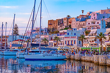 Dusk with yachts moored at the harbour waterfront in Naxos Town, Naxos, the Cyclades, Aegean Sea, Greek Islands, Greece, Europe