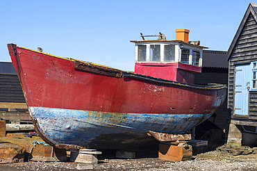 Old fishing vessel in boatyard near the river Blyth in the county of Suffolk, East Anglia.