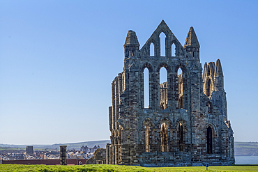 The dramatic ruins of St Hilda's Abbey on the cliftop overlooking Whiby In the county of Yorkshire.