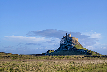 The 16th century Lindisfarne Castle on a hillock overlooking the island of Lindisfarne (Holy Island).