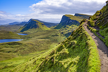 Footpath through the rugged hills of the Trotternish escarpment on the northernmost peninsula of the Isle of Skye, Inner Hebrides, Scotland.