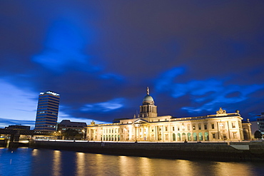 Custom House, illuminated at dusk, reflected in the River Liffey, Dublin, Republic of Ireland, Europe